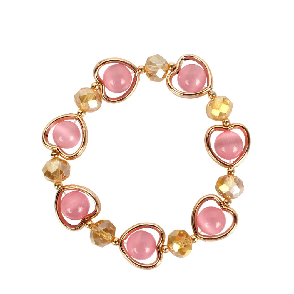 Женский браслет с подвесками украшенный кристаллами и бусинами подарочные