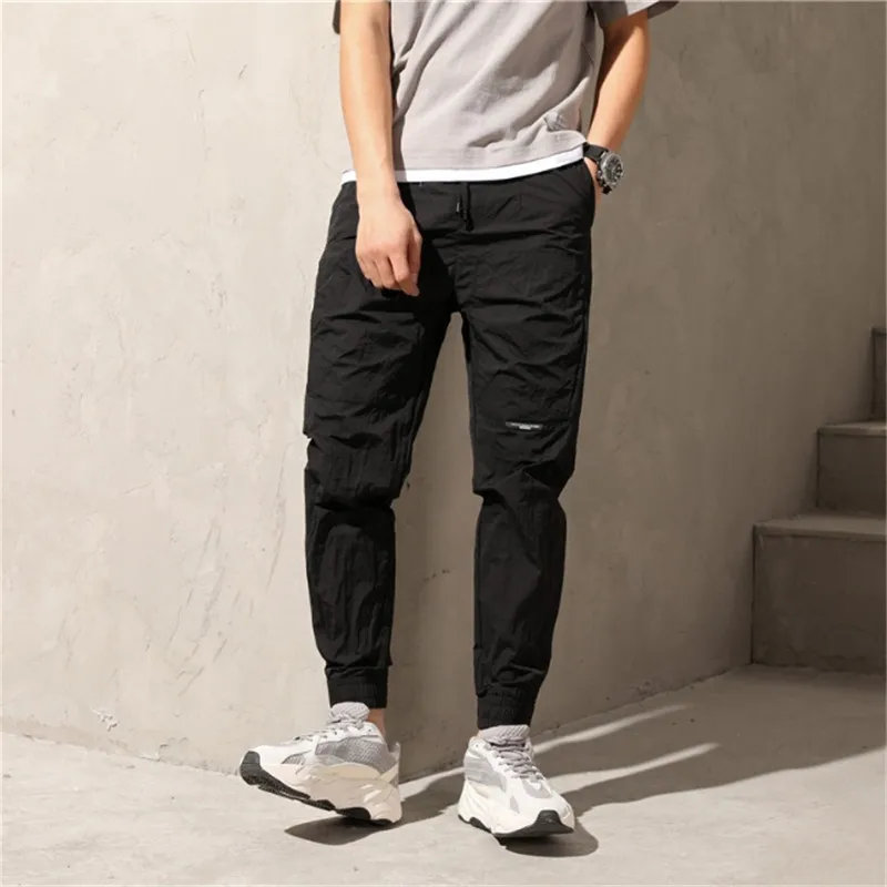 

Loose nine-cent casual pants Personal overalls Over-heated self-cultivation with foot-binding ins Small-footed Cargo Tide Pants