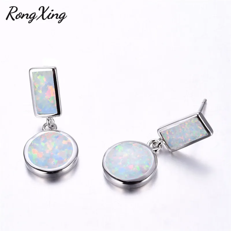 Женские серьги подвески с опалом серебристого цвета| |