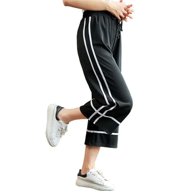 Женские широкие брюки на завязках летние свободные красного черного синего