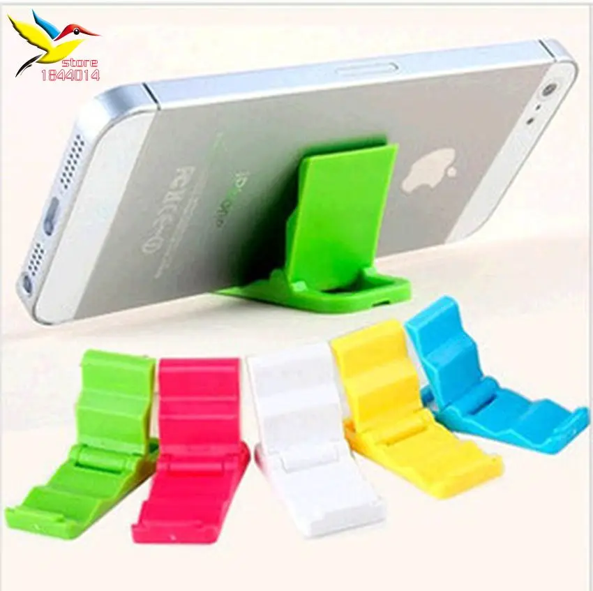 

Hot good quality Portable compact mobile phone Fold holder Mini Desk Station Plastic Stand Folding Holder For Phone 3000 pcs