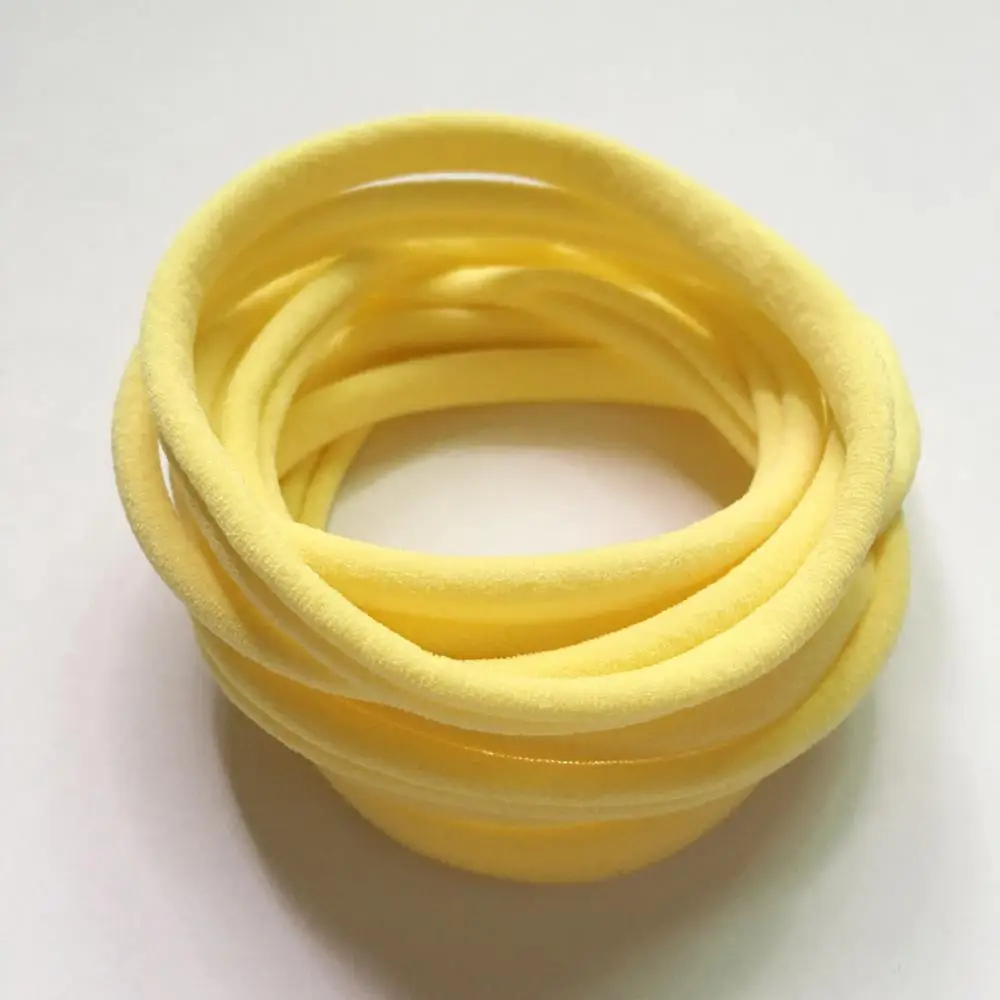 Baby yellow 10 шт./партия, Новые однотонные нейлоновые эластичные повязки на голову, мягкие эластичные нейлоновые повязки на голову, один размер подходит для большинства - Цвет: Baby yellow