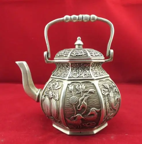 

Exquisite Chinese old miao silver Duck Fish Phoenix Auspicious Designs Statue Teapot