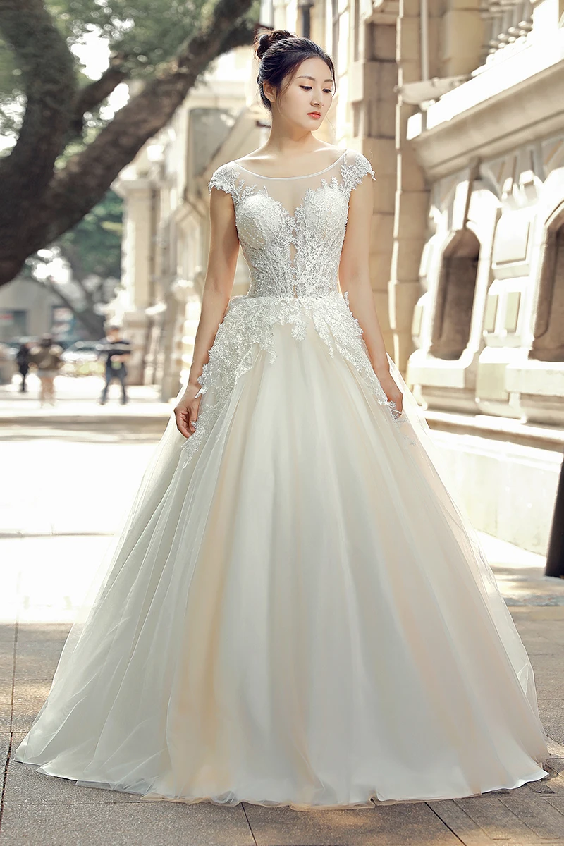 

Newest Backless Wedding Dresses Illusion O Neck Sleeveless Bridal Gown Boho Beach Bridal Dresses Vestido De Noiva 2018