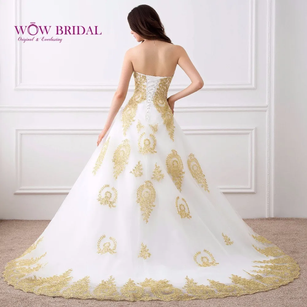 Wowbridal свадебное платье трапециевидной формы с вышивкой золотистого цвета белым