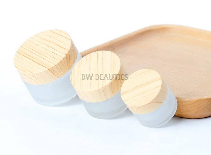 

100pcs 5/10/15/30/50g Frosted Glass Jar Skin Care Cream Refillable Bottle Cosmetic Container With Wood Grain Lid Eye Cream Jars