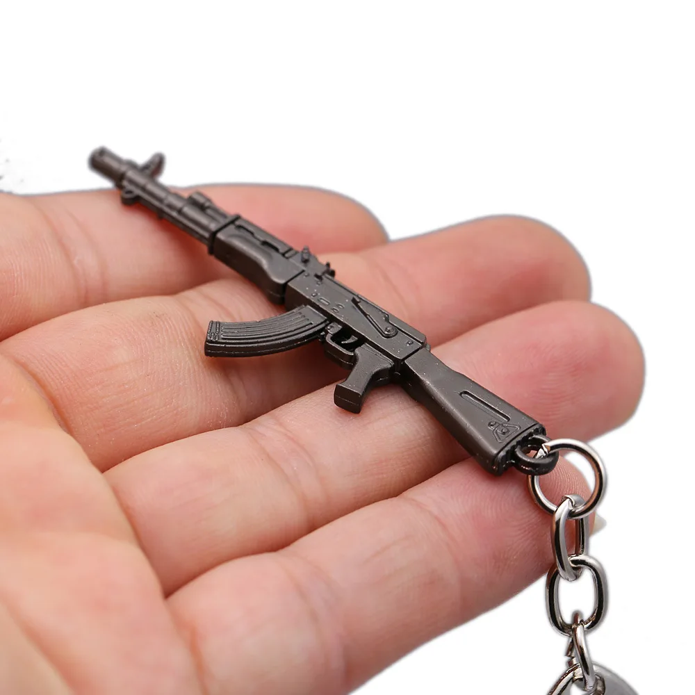 Горячая игра 16 видов стилей PUBG CS GO брелоки в виде оружия AK47 пистолет Модель 98 к снайперская винтовка брелок для мужчин Подарки Сувениры 6 см - Цвет: 9