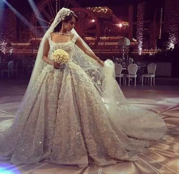 

Luxury Beaded Pearls Wedding Dresses 2016 Backless Beach Bridal Gowns A-Line Appliques Pleated Vintage Wedding Gown Arabic Dubai