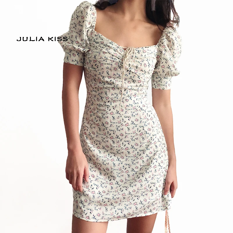 

Женское мини-платье с завязкой на шее, цветочным принтом и пышными рукавами
