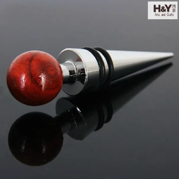 

Два наших производителя круглых винных стопоров из красного дерева