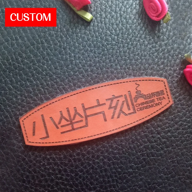 

factory private customzied PU leather embossed sewing on baby clothes printing fashion handmade washable leather main labels