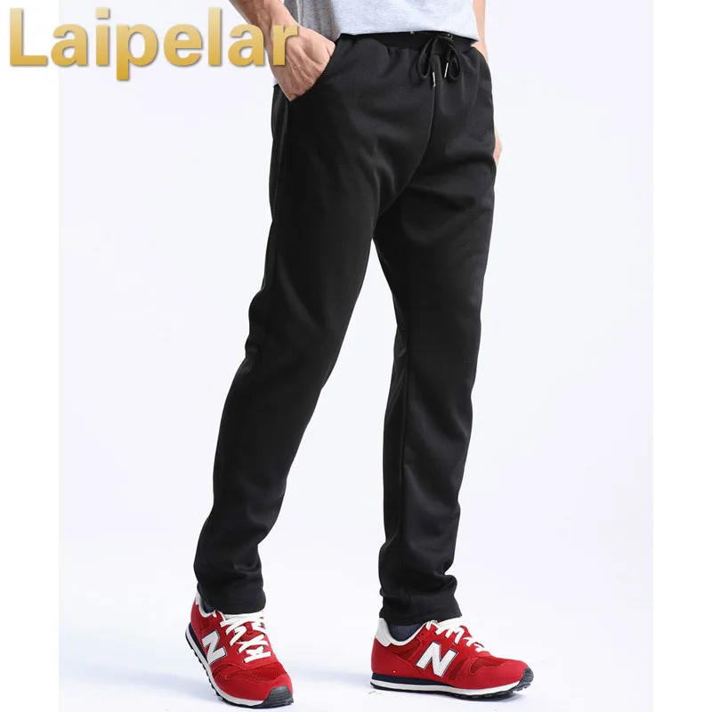 

Men's Casual Loose Cotton Sweatpants Fitness Pants Male Elastic Waist Fashion Trousers For Casual Streetwear Joggers Pants