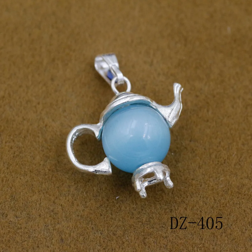 Женская подвеска из серебра микро инкрустированная в виде чайника кошачий