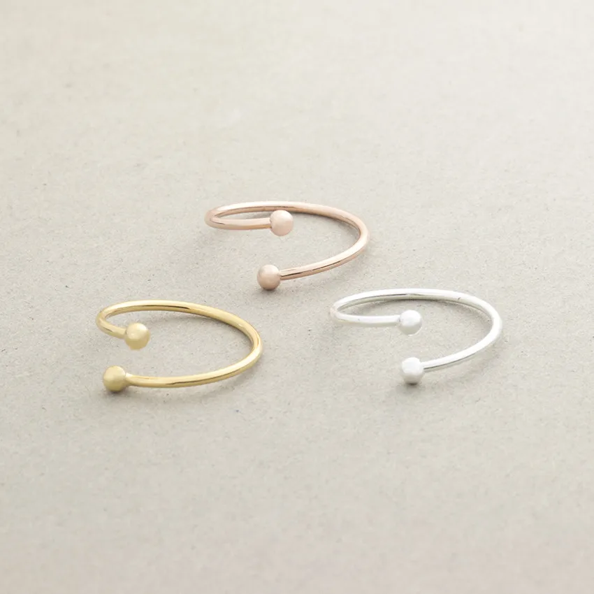 Женское и мужское мини кольцо с двумя шариками розовое золото минималистичные