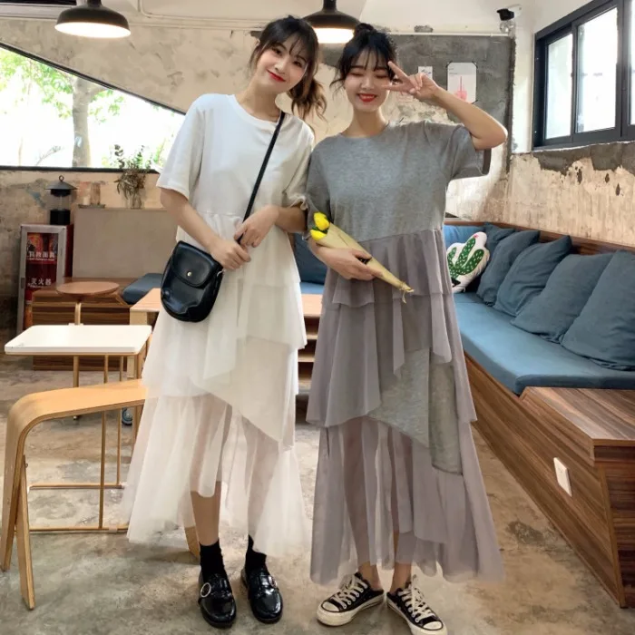 

French niche Women's Dress female Korean version of the loose mesh stitching section irregular cake tide Summer long Dress Women