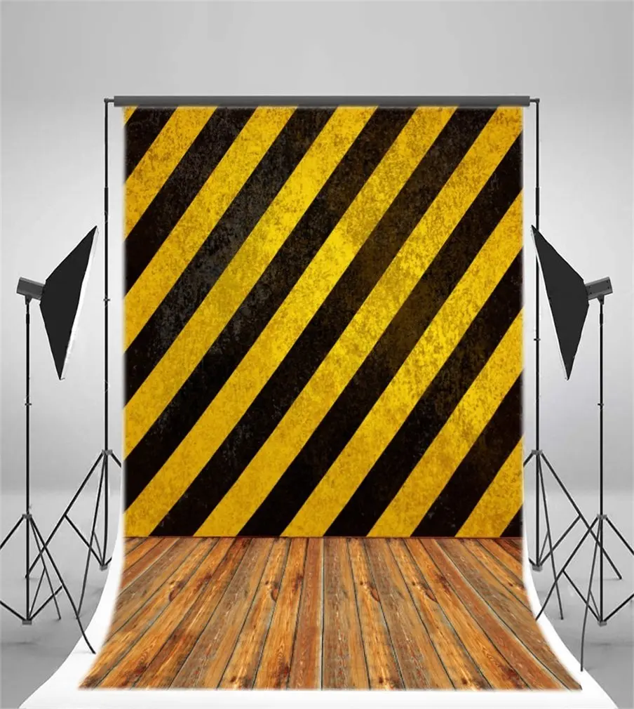 

Photography Backdrop Black and Yellow Warning Wooden Floor