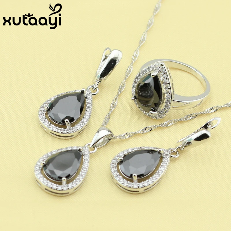 Красивый набор серебряных ювелирных изделий с голубым Цирконом в форме капли