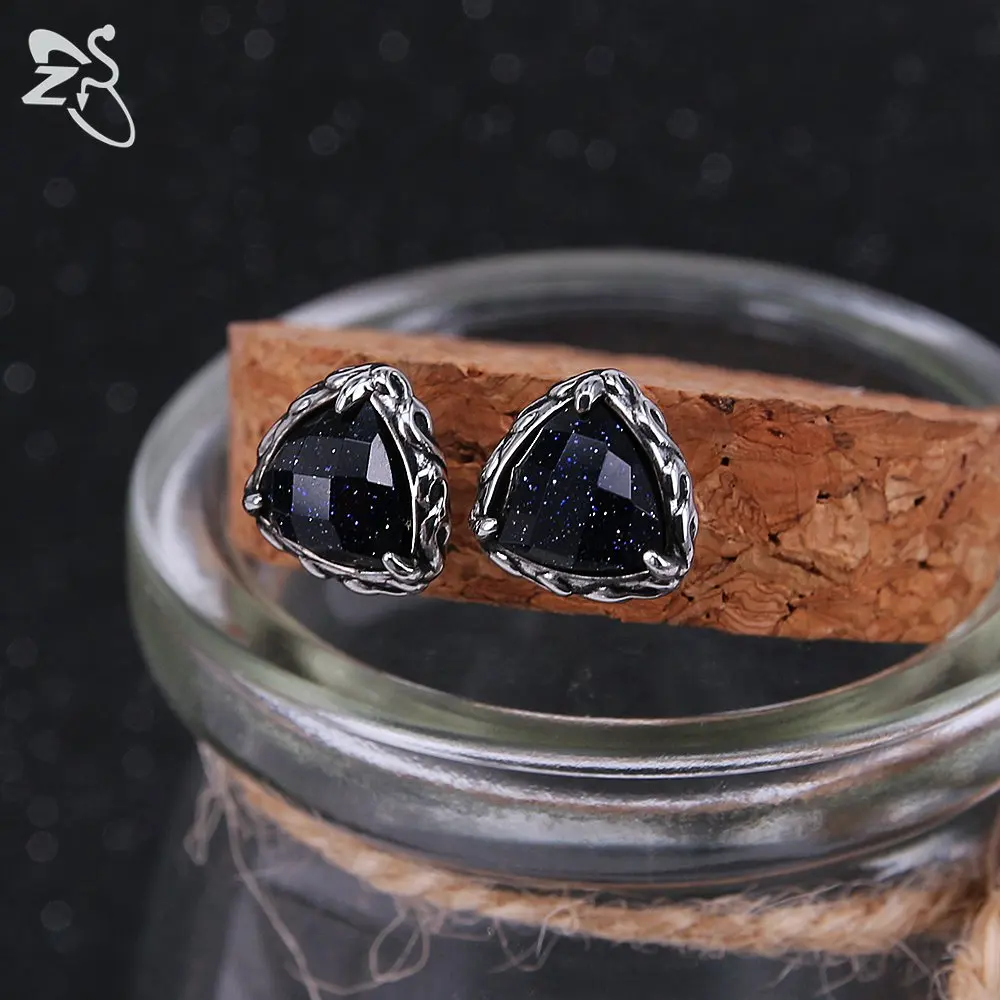 Серьги-гвоздики в виде темно-синих звезд с фианитом завитка ушной раковины