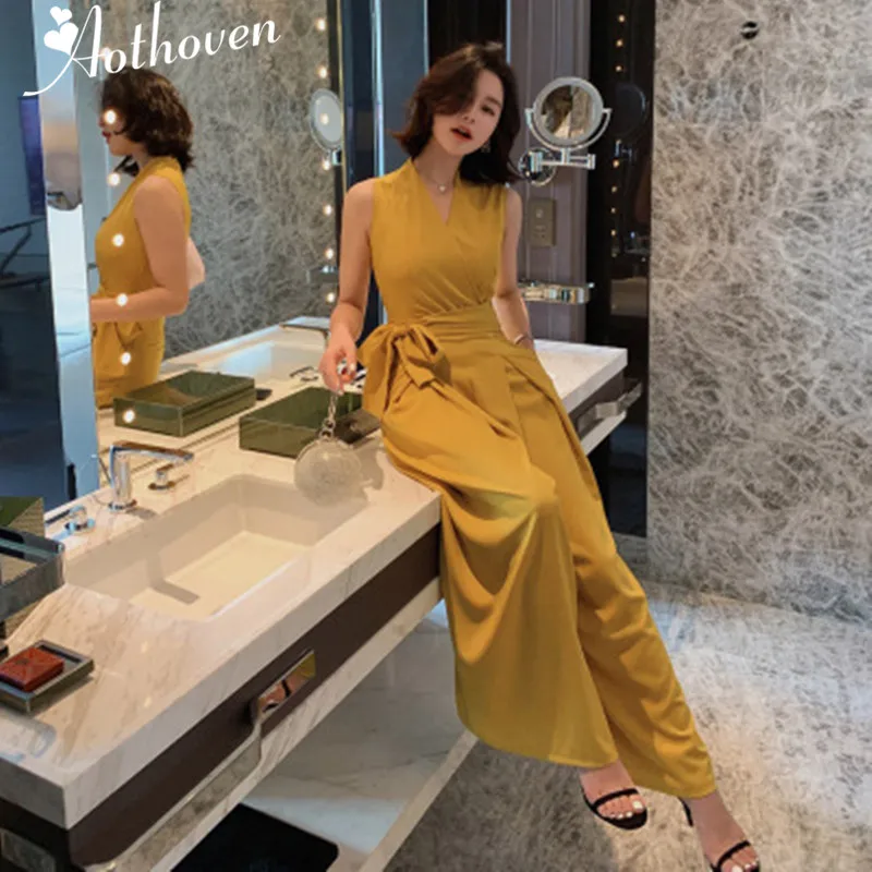 

2019 Summer V Neck Party Catsuit Overalls Long Rompers Sexy Women Yellow Jumpsuit Sashes Bodysuit Club Pants Playsuits Rompers