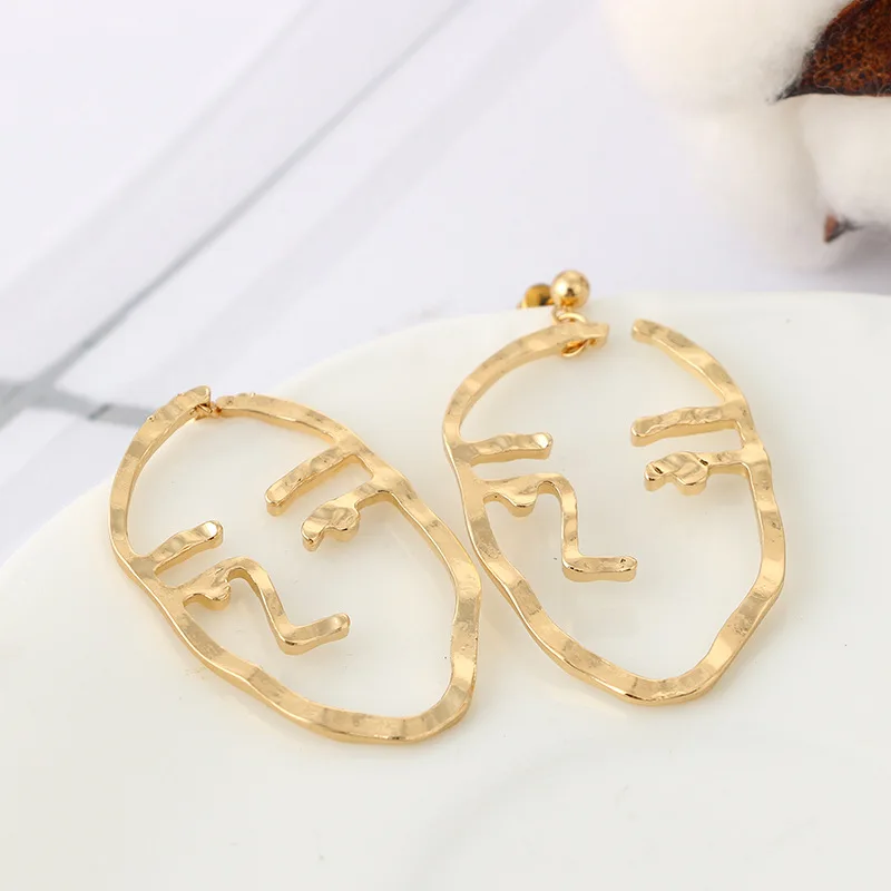 Женские серьги абстрактные золотого серебряного цвета с полукруглой подвеской |