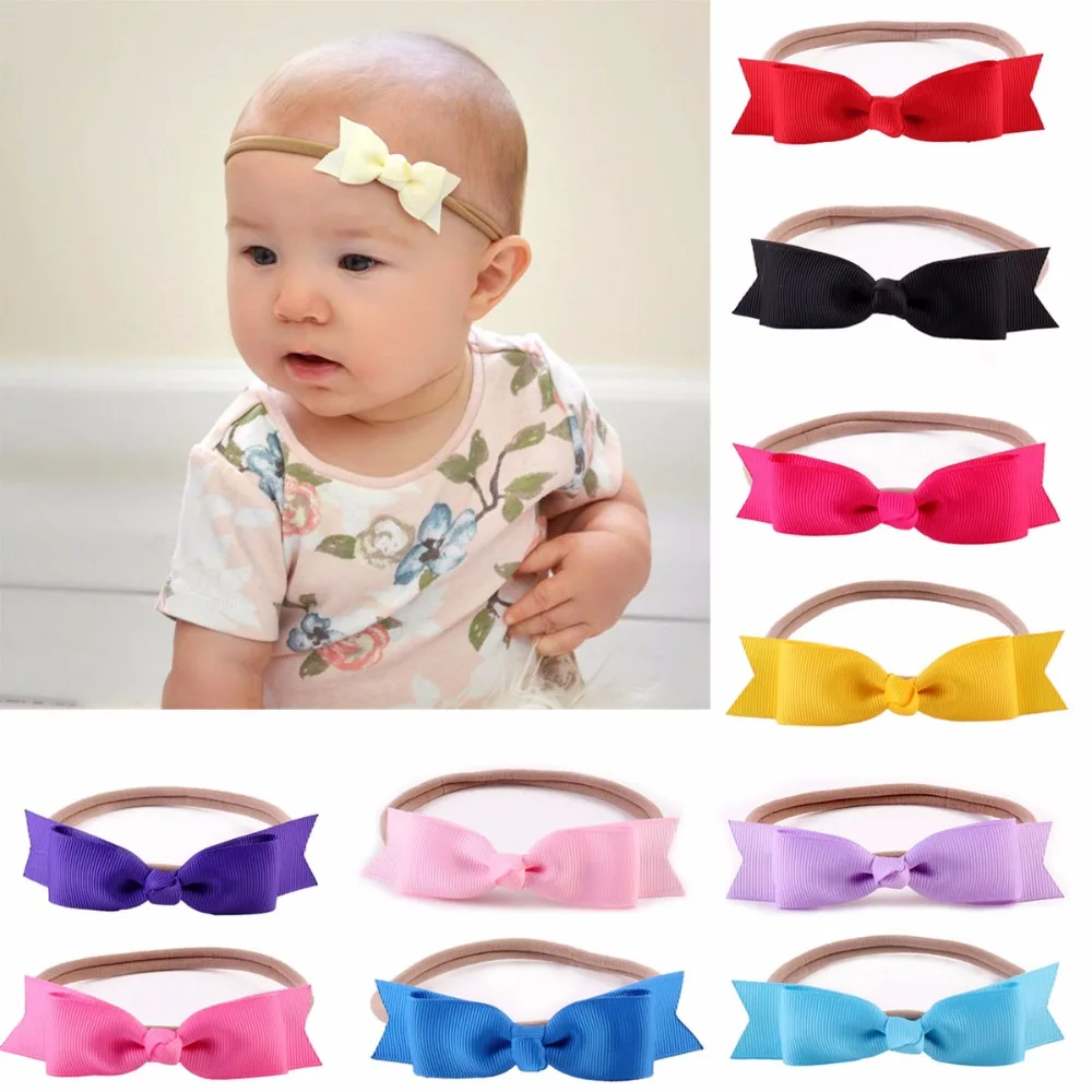 Двухслойная повязка на голову ручной работы с бантом однотонная эластичная