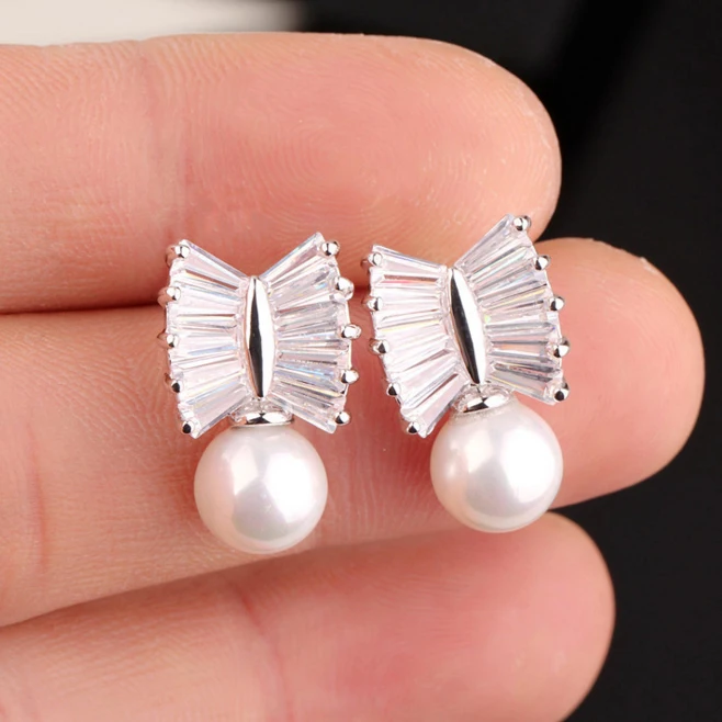 

Simple and delicate anti - allergy bow tie zircon pearl earrings earrings