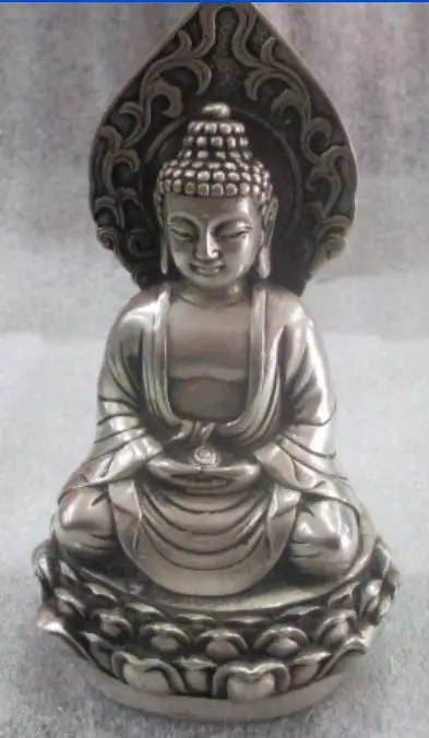 

The ancient Chinese sculpture Buddha had silver plated brass.The Buddha
