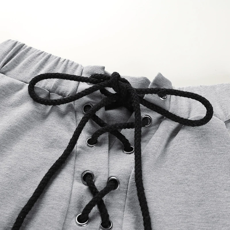 Брюки с дырками эластичные рваные спортивные штаны до щиколотки джоггеры