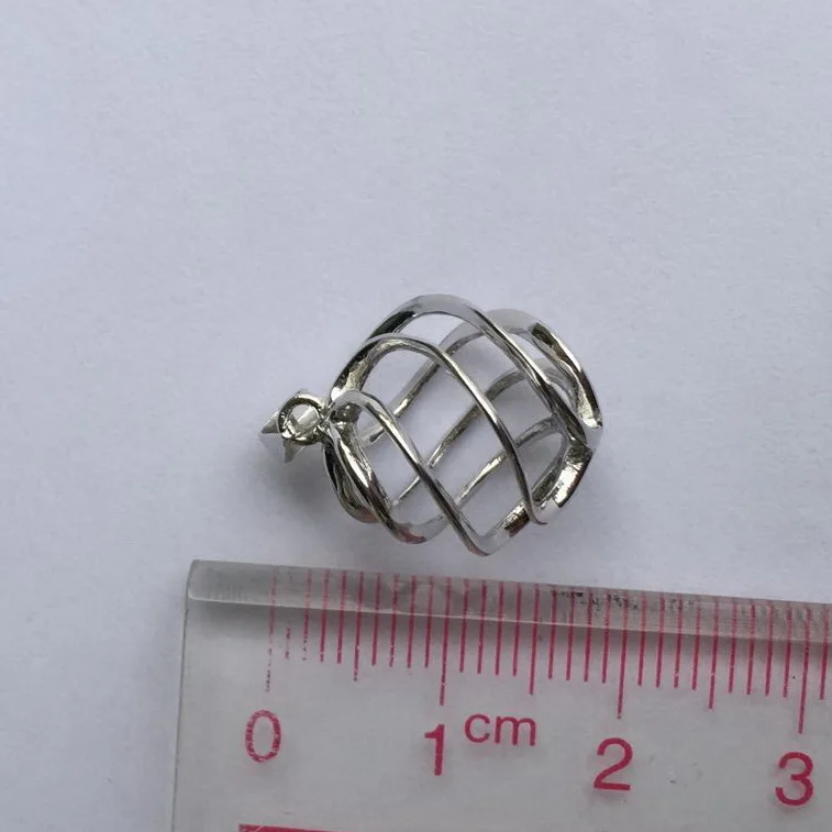 Пустотелая витая клетка в форме шара медальон из серебра 925 пробы можно держать 11