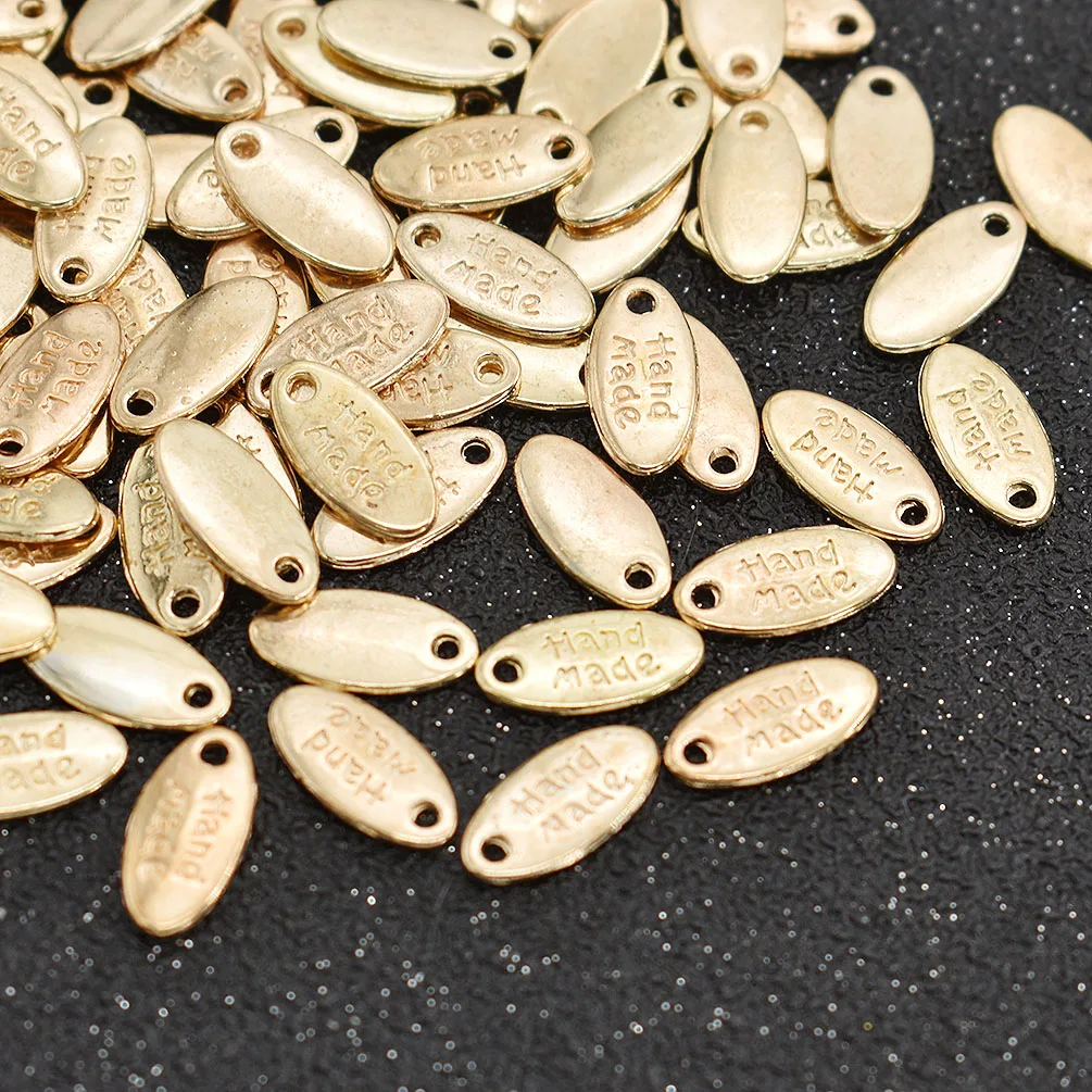 Seed Shape 100 шт./лот 4 стиля золотого цвета сплав металла ручной работы этикетки бирки для одежды сумки DIY Швейные материалы - Цвет: Seed Shape