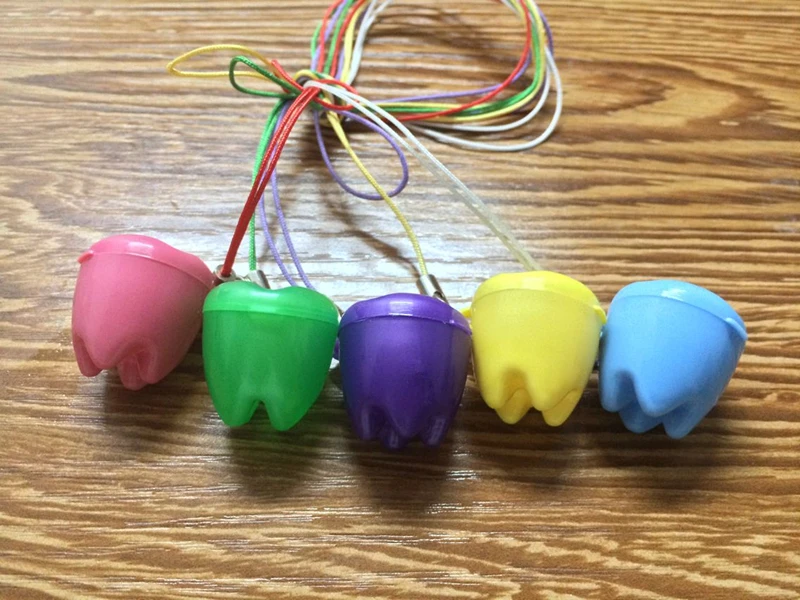 Бесплатная доставка 100 шт./компл. пластиковый держатель для детских зубов разные