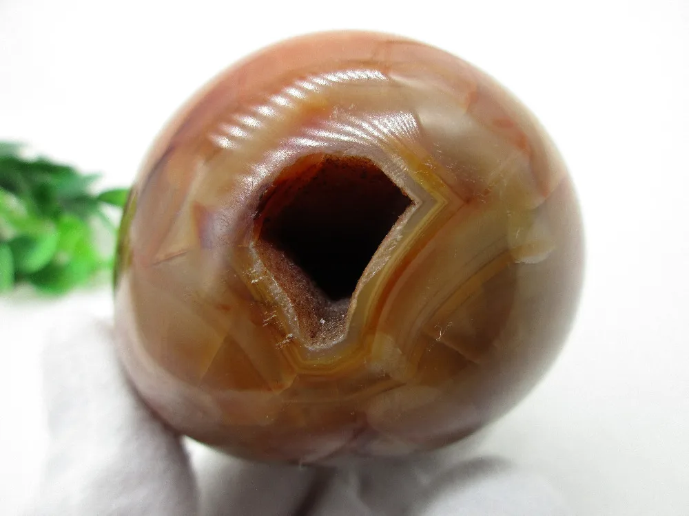 

Natural Stone Red Agate Playing With Hole Chakra Healing Reiki Stone Carving Crafts From Madagascar