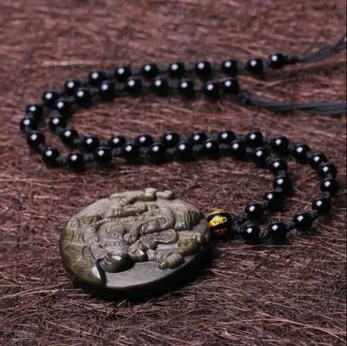 Кулон-талисман "Счастливый слон" из природного золотистого обсидиана ручной работы от Koraba Fine Jewelry. Бесплатная доставка.