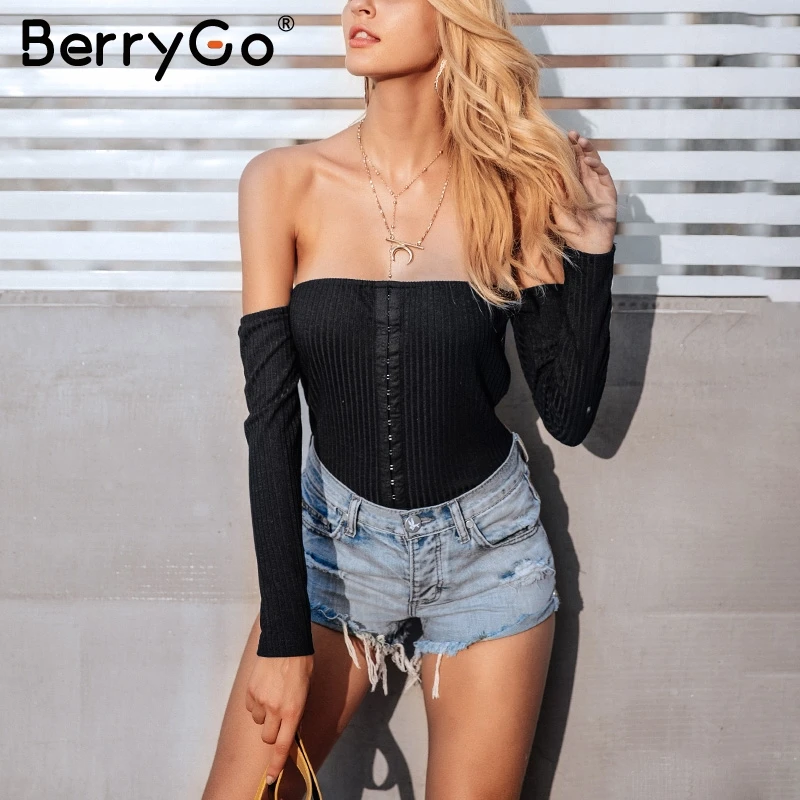Женский трикотажный комбинезон BerryGo черный облегающий с длинным рукавом и