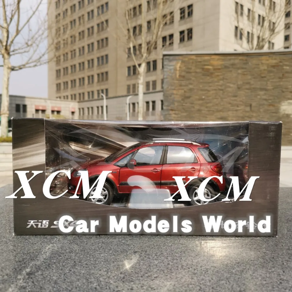 Модель литая автомобиля для кроссовера SX4 (оранжево красный) 1:18 + небольшой