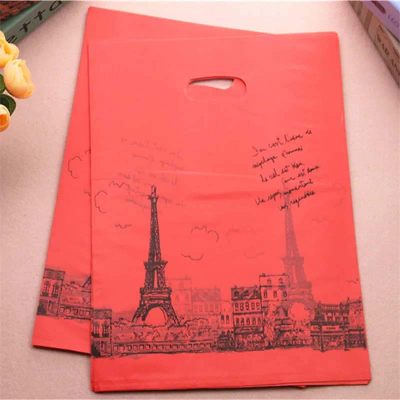 

2021 New Design Wholesale 100pcs/lot 30*40cm Luxury Red Shopping Bags With Eiffel Tower Plastic Clothing Packaging Gift Bags