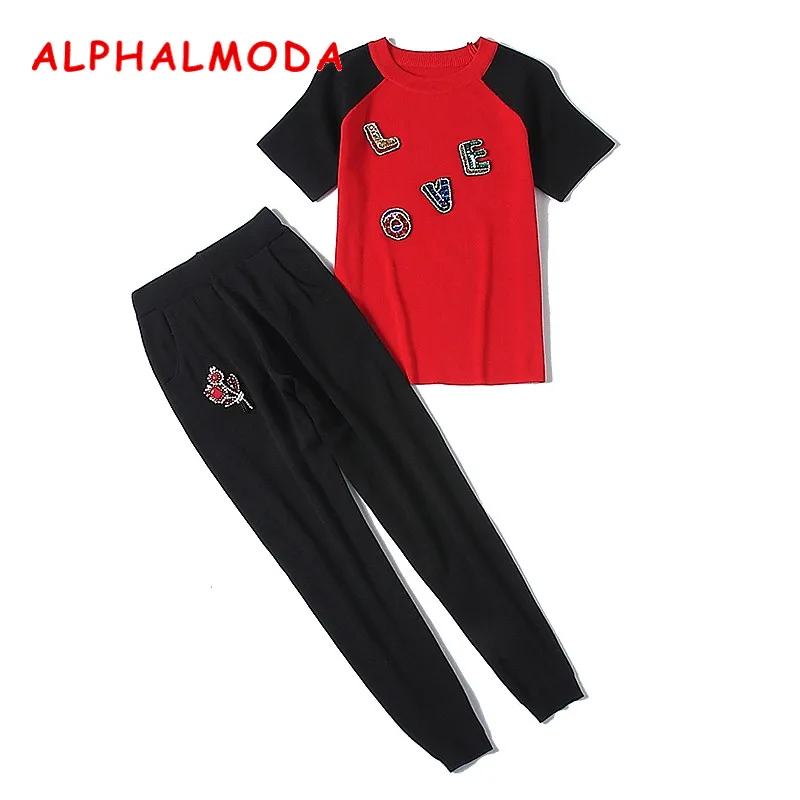 Женский вязаный костюм ALPHALMODA свитер с аппликацией букв + штаны цветами комплект