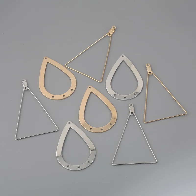 Женские металлические серьги-подвески серебристые/золотистые треугольные