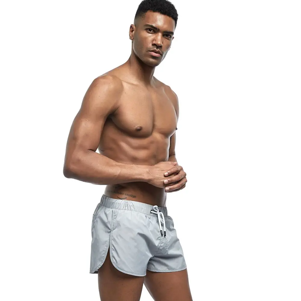 JOCKMAIL новые Брендовые мужские шорты быстросохнущие летние выходные Пляж Surf карманные Плавки Спортивные шорты для бега Hybird