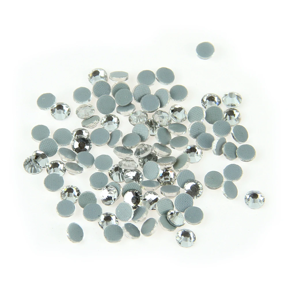 

Hot Sell Best Quality Hotfix Rhinestones ss30 Clear 40Gross Machine Cut For Clothes Free Shipping