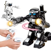 2 4g body sense battle remote control robot rc intelligent robot combat toys for kids gift toy with box light and sound boxer
