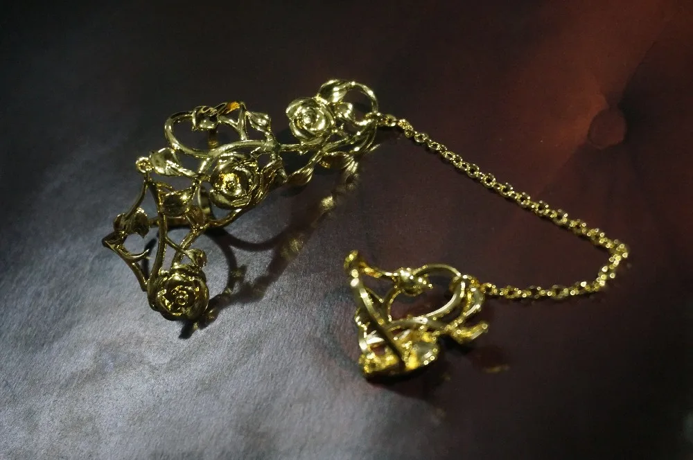 Кольцо на два пальца с цепочкой розовым пером золотым и серебряным покрытием |