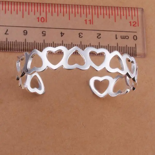 Браслет-манжета с сердечками corazon coracao love heart, Браслет-манжета на руку, браслет jonc серебряного цвета, уникальный de marque, цена Dahu Rico, браслеты