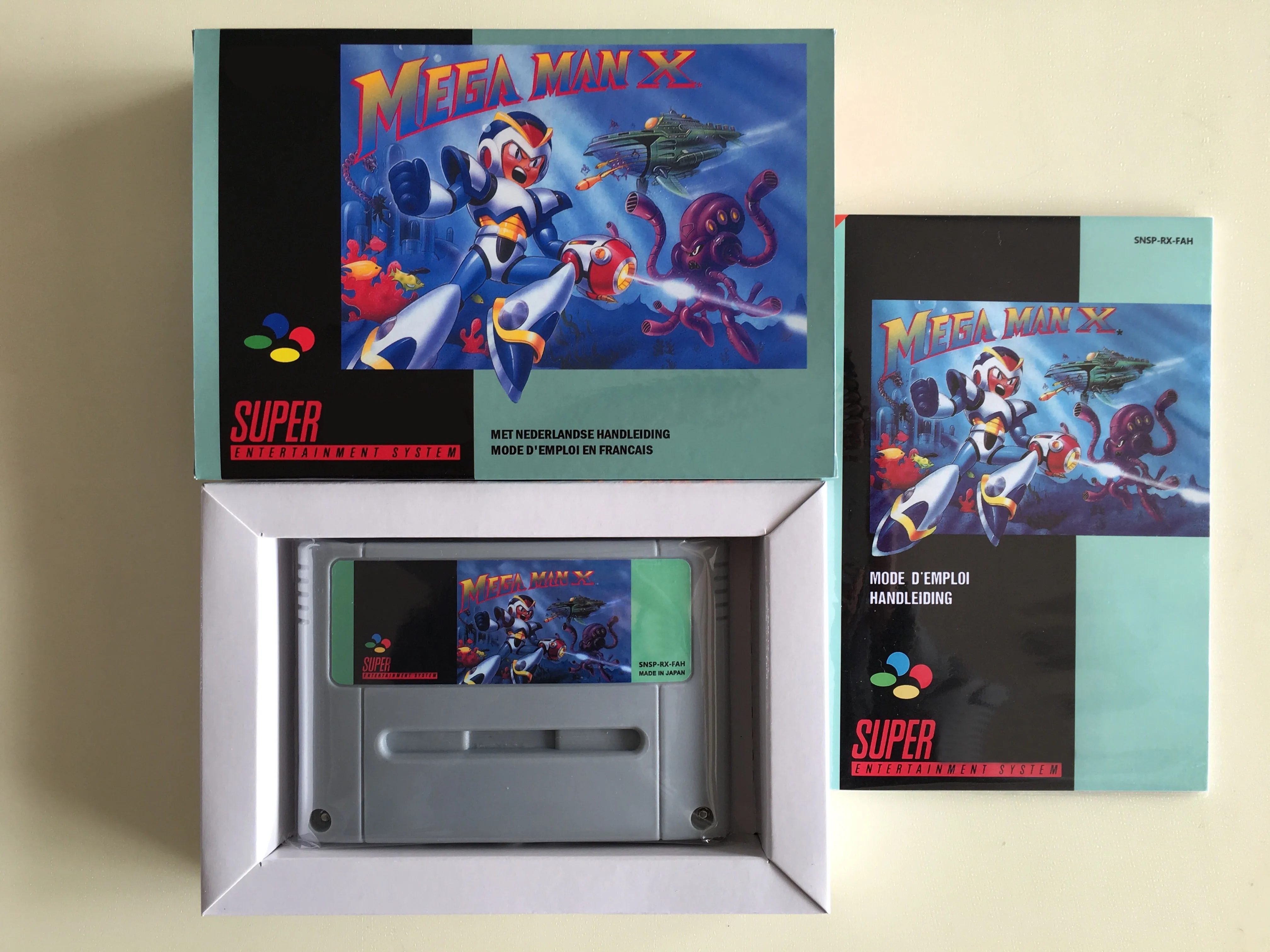 16 битные игры* MEGA MAN X(Французская версия PAL! Коробка+ руководство+ картридж