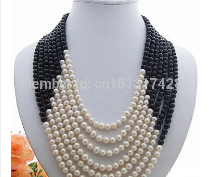 

FREE SHIPPING>>>7Strds White Pearl&AA Necklace