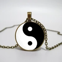 creative ice and fire tai chi symbol necklace fusion of yin yang bagua glass cabochon pendant statement necklace jewelry