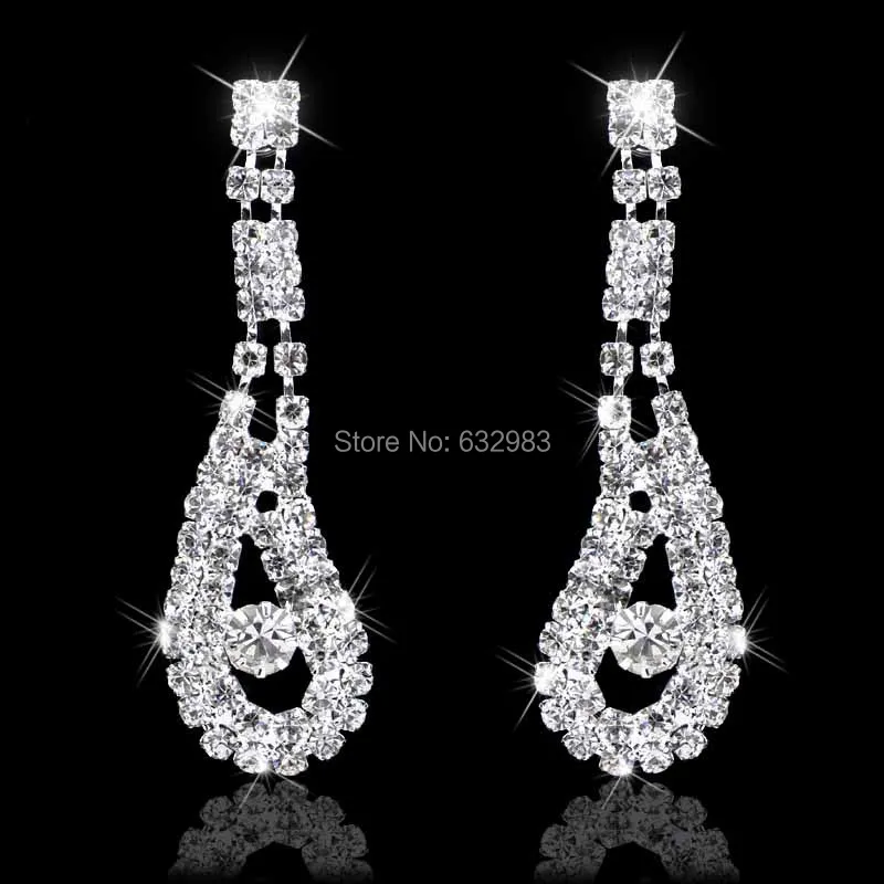 Серьги подвески женские с павлиньими перьями висячие ювелирные украшения для