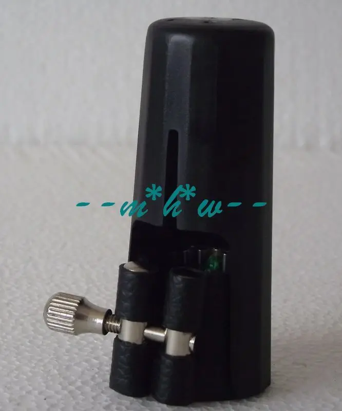 

Excellence Tenor sax ligature and cap Apply to bakelite mouthpiece