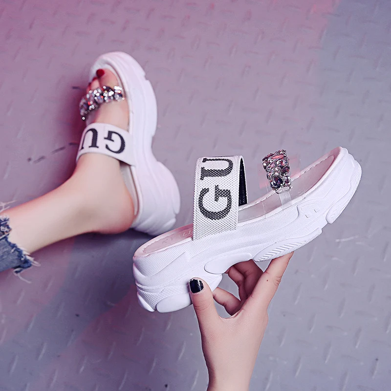 

Slipper lady outside wearing 2021 new summer fashion transparent loafers with high heels and women platform slippers