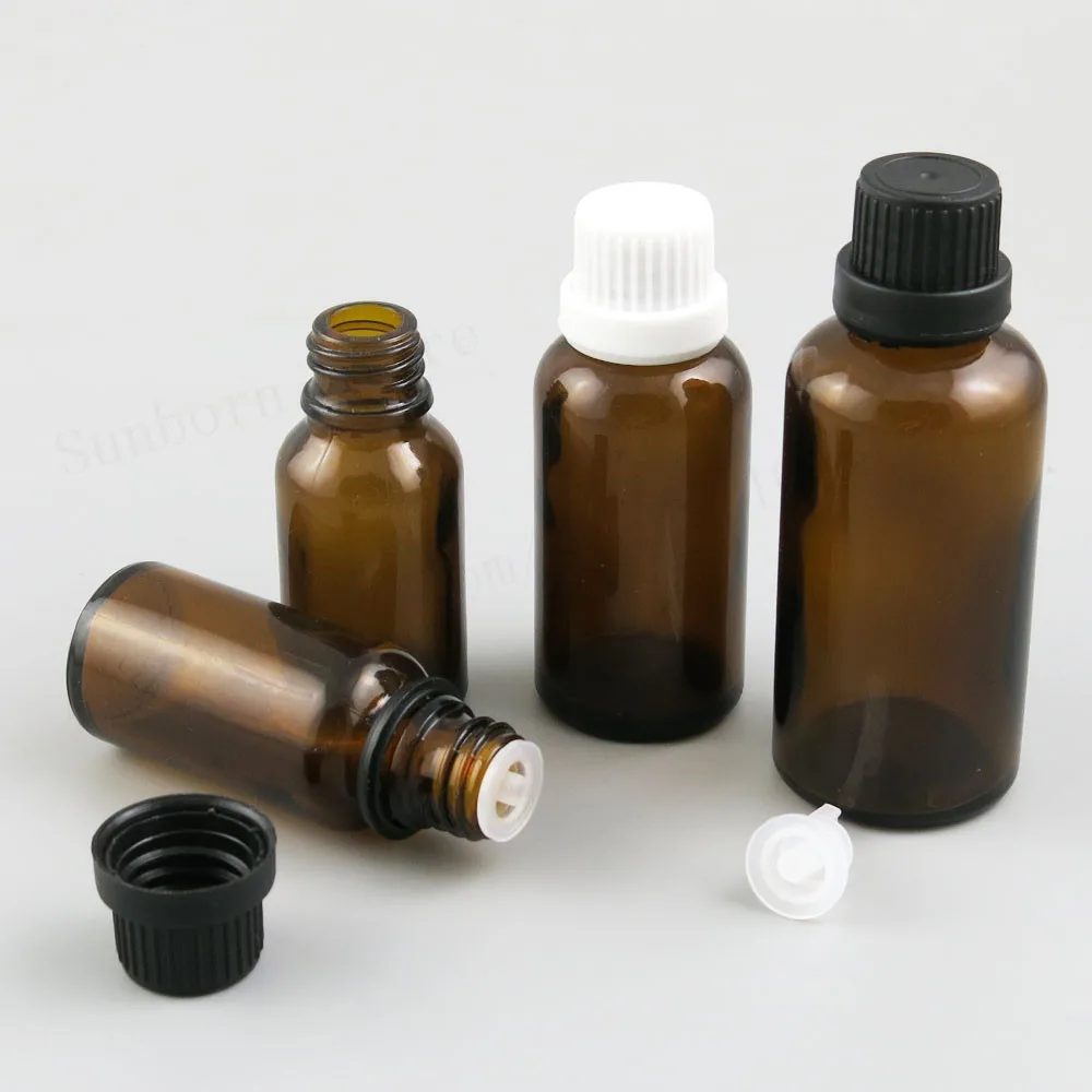 

20pcs Empty Clear Amber Glass Essential Oil Container Bottle With Tamper Evident Plastic cap 5ml 10ml 15ml 20ml 30ml 50ml 100ml